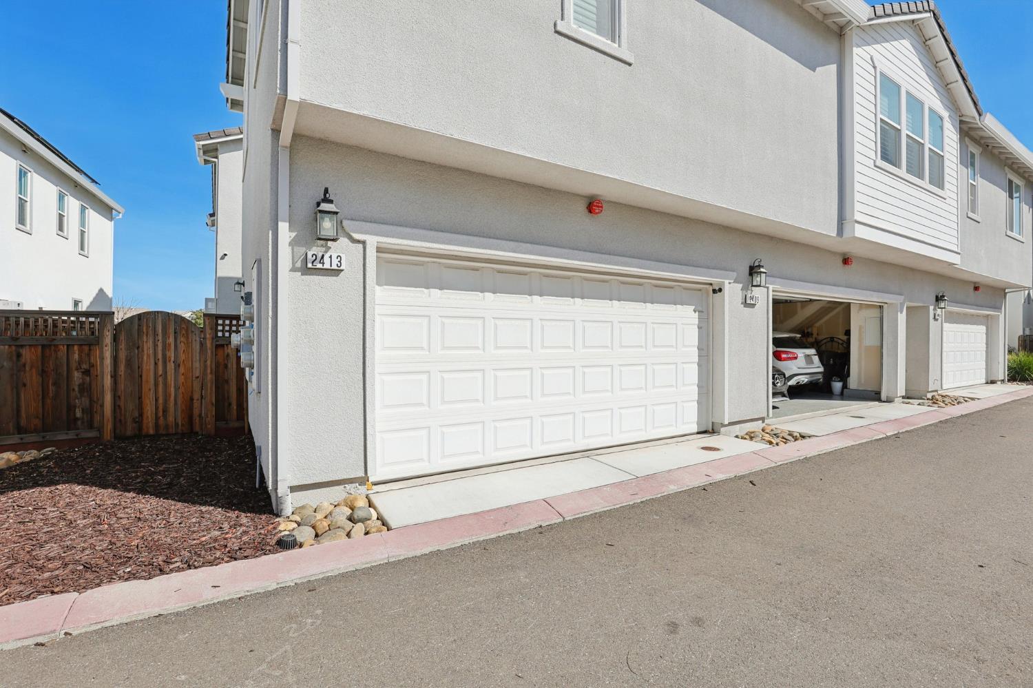 2413 Seaside Road Lathrop, CA 95330 - Photo 28 of 37 a view of a car garage garage