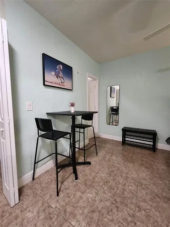 a view of a workspace with furniture