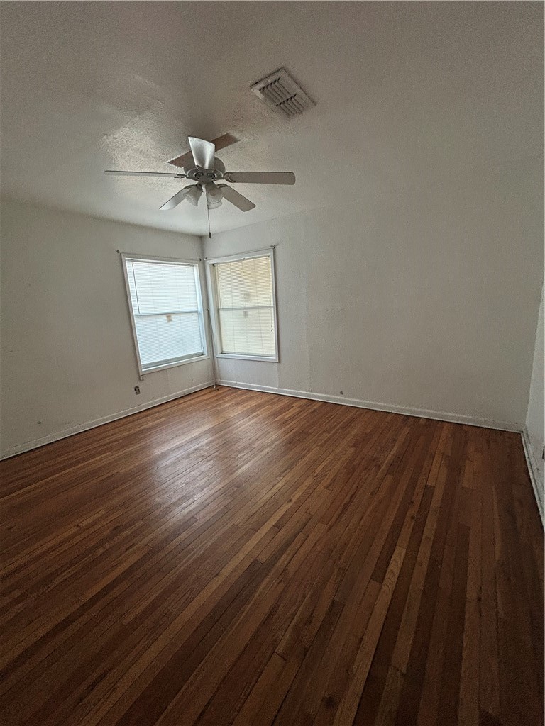 1041 East 5th Street Alice, TX 78332 - Photo 8 of 19 wooden floor in an empty room