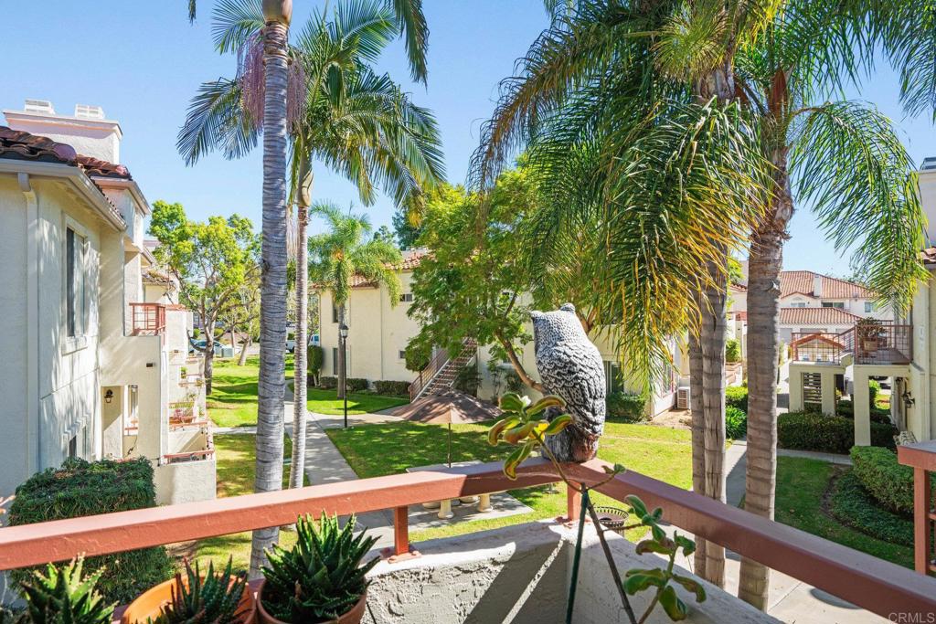 430 Stoney Point Way, Unit 129 Oceanside, CA 92058 - Photo 12 of 38 a view of a balcony with palm trees