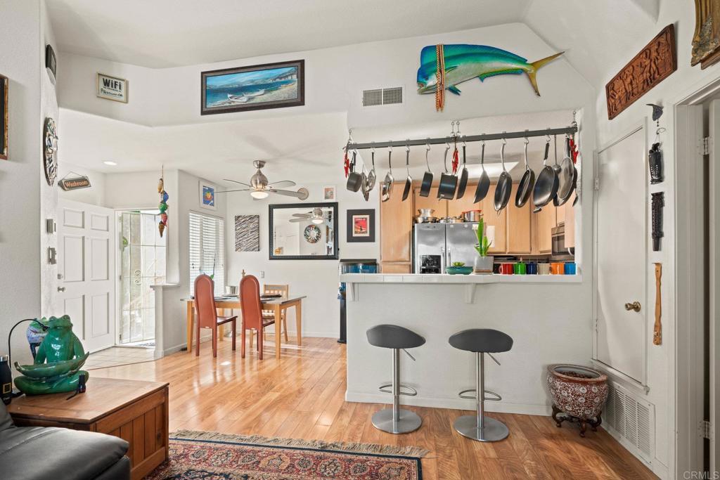 430 Stoney Point Way, Unit 129 Oceanside, CA 92058 - Photo 16 of 38 a living room with furniture and a window