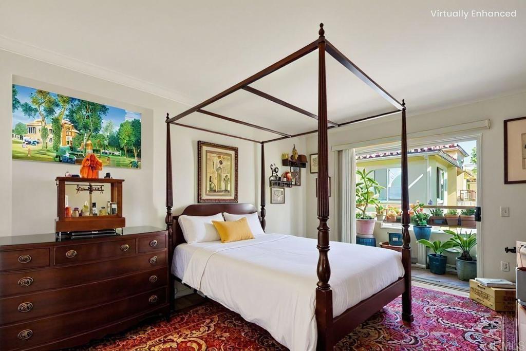 430 Stoney Point Way, Unit 129 Oceanside, CA 92058 - Photo 17 of 38 a bed room with a bed and a dresser