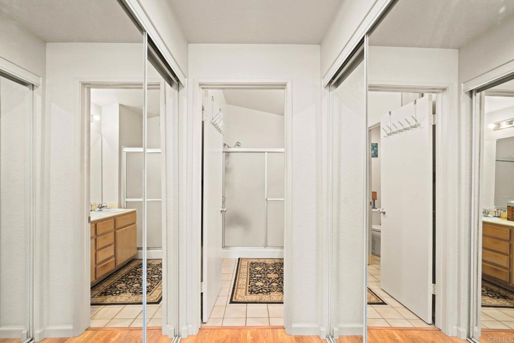 430 Stoney Point Way, Unit 129 Oceanside, CA 92058 - Photo 18 of 38 a view of a bathroom with wooden floor