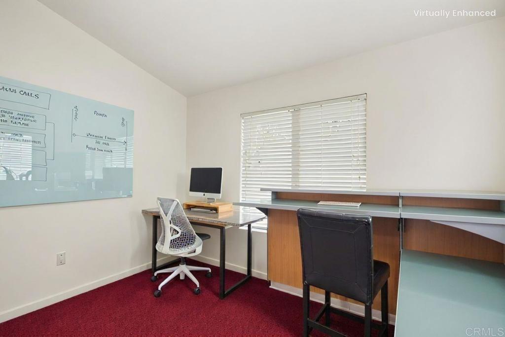 430 Stoney Point Way, Unit 129 Oceanside, CA 92058 - Photo 22 of 38 a view of a workspace with furniture and a window
