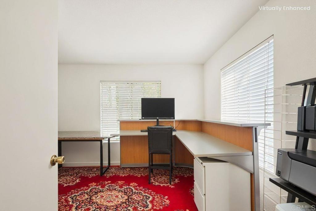 430 Stoney Point Way, Unit 129 Oceanside, CA 92058 - Photo 23 of 38 a workspace with furniture and window