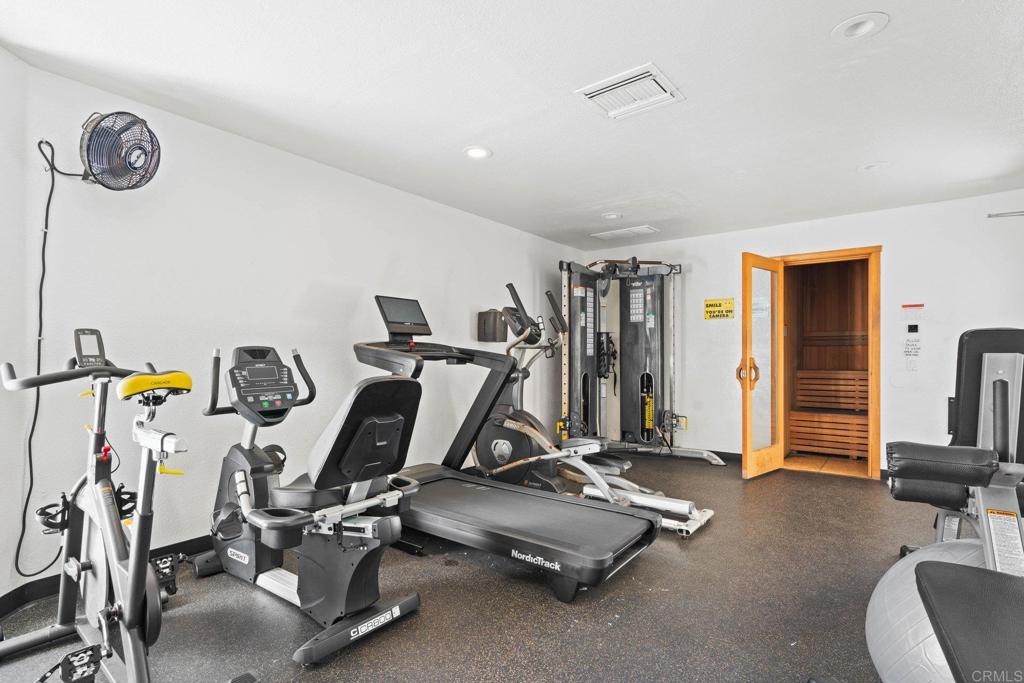 430 Stoney Point Way, Unit 129 Oceanside, CA 92058 - Photo 37 of 40 a view of a room with gym equipment