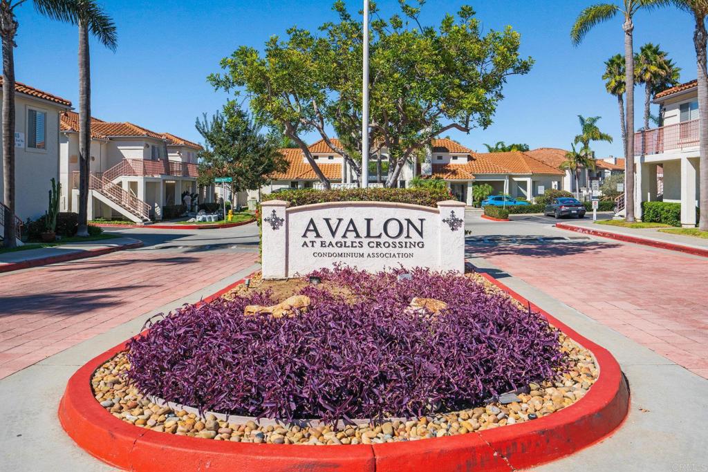 430 Stoney Point Way, Unit 129 Oceanside, CA 92058 - Photo 7 of 40 a view of a street with a building in the background
