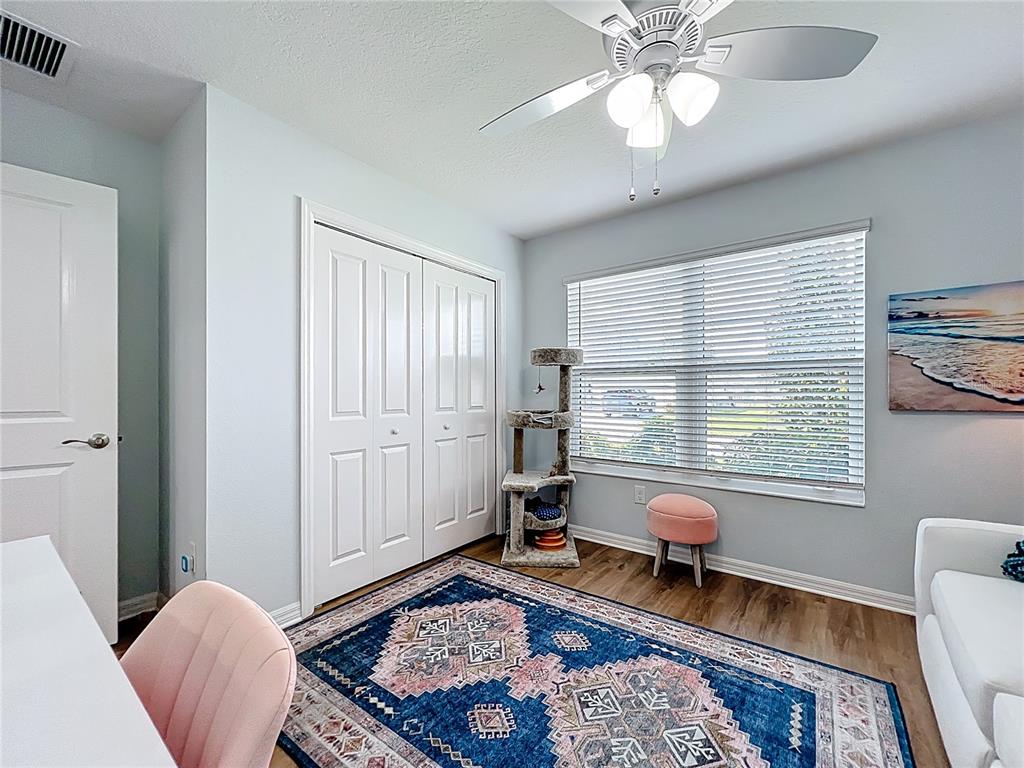 6370 Danielson Loop The Villages, FL 32163 - Photo 33 of 55 a bedroom with furniture and a window