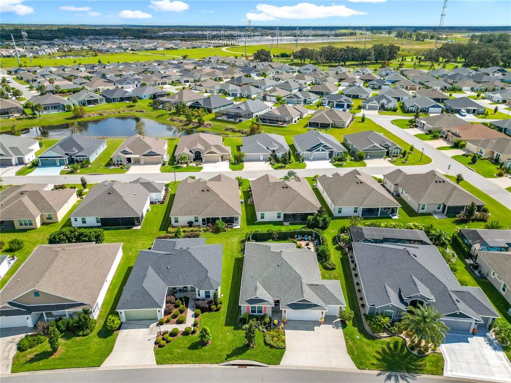 6370 Danielson Loop The Villages, FL 32163 - Photo 55 of 55 an aerial view of residential houses with outdoor space