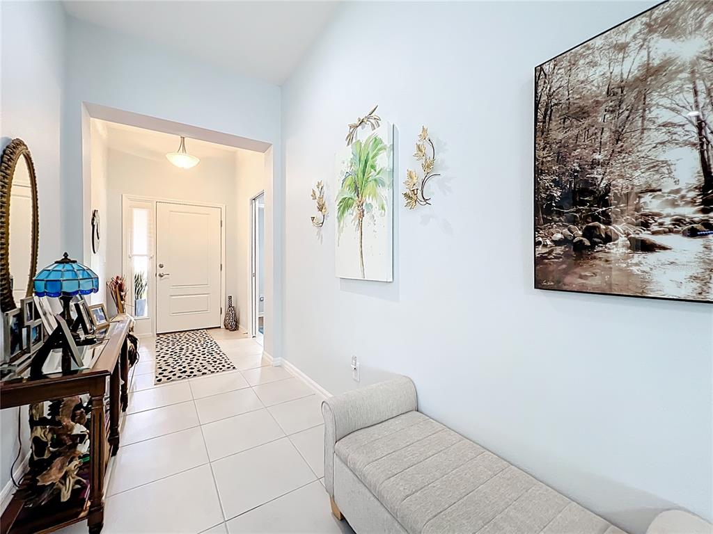 6370 Danielson Loop The Villages, FL 32163 - Photo 7 of 55 a living room with furniture and next to a window