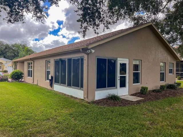 a bathroom with a toilet and a shower curtain