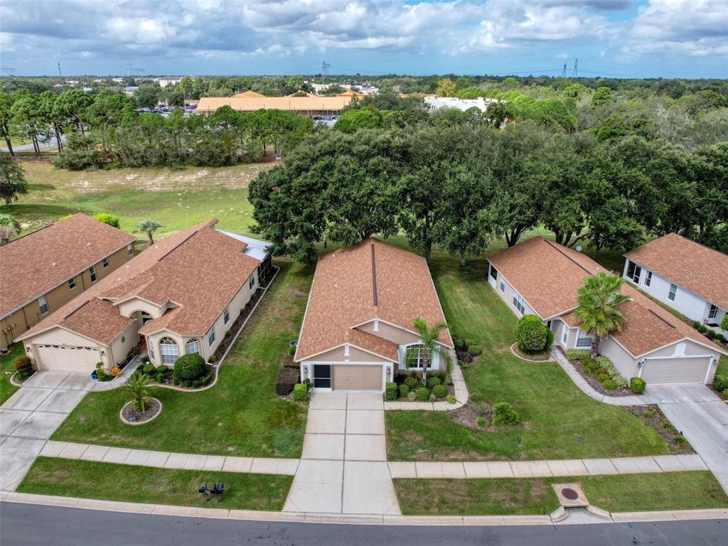 189 Center Oak Circle Spring Hill, FL 34609 - Photo 4 of 61 an aerial view of multiple houses
