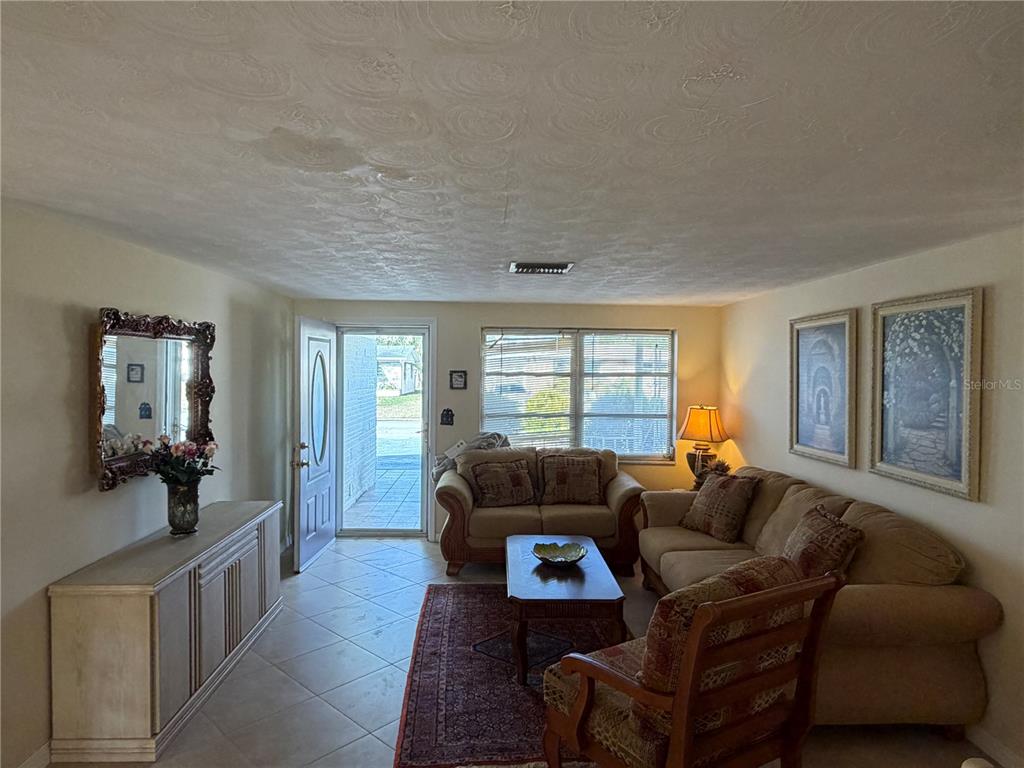 3914 Carioca Road Holiday, FL 34691 - Photo 5 of 23 a living room with furniture and a window