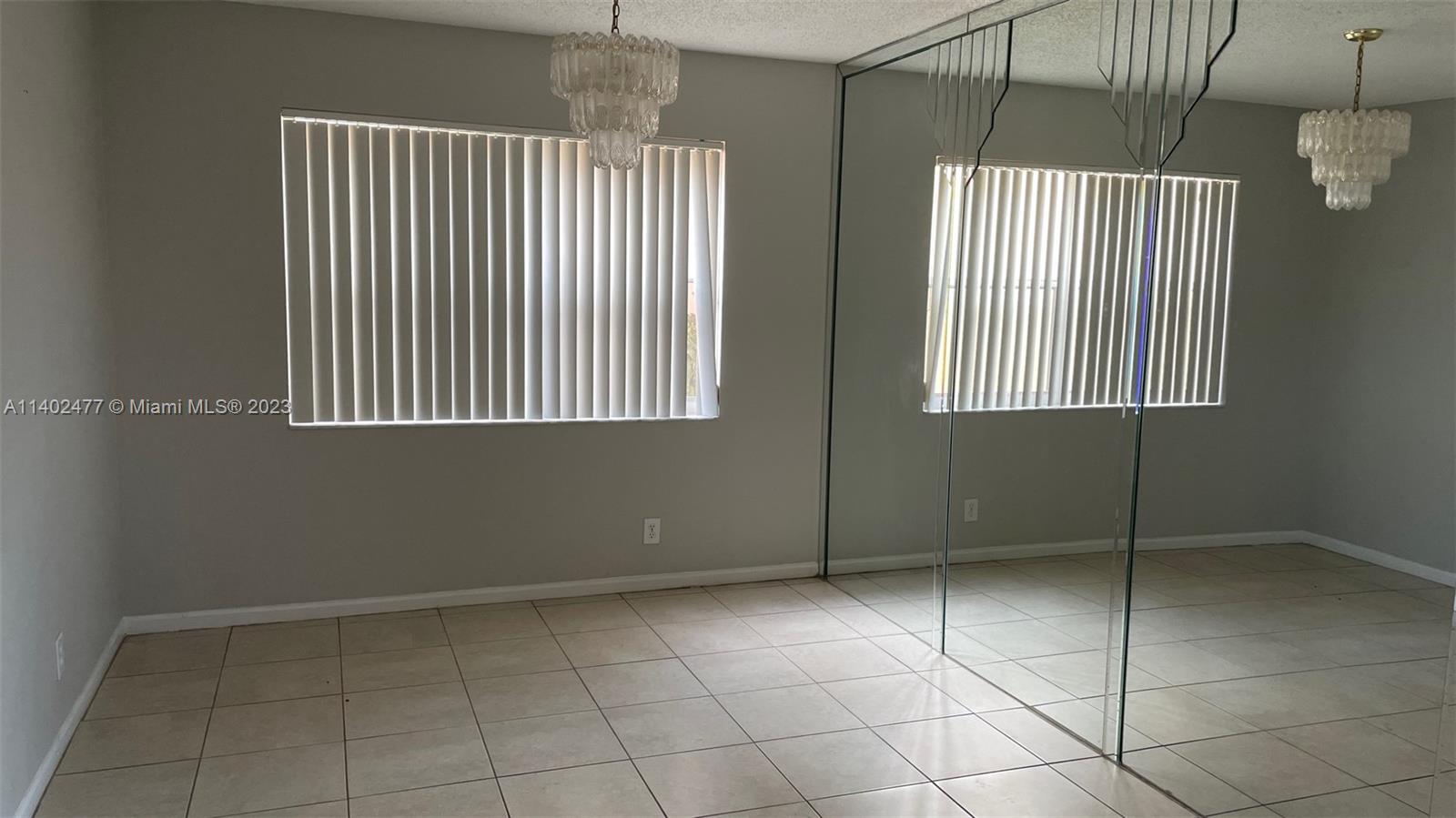 Silver Lakes Miramar, FL 33029 - Photo 9 of 14 a view of an empty room with a window