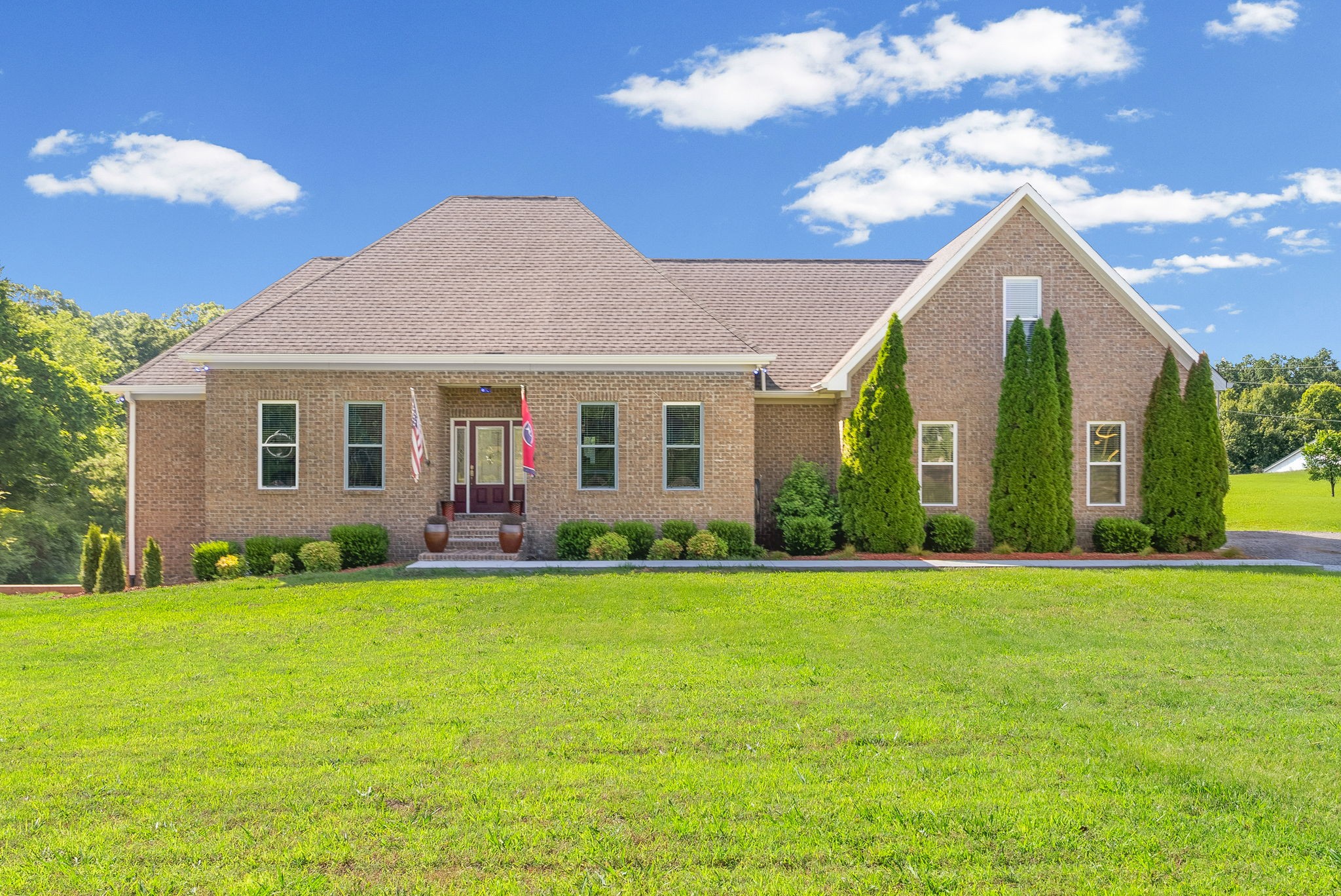 4940 Marion Road Cunningham, TN 37052 - Photo 1 of 43 a view of a house with a yard