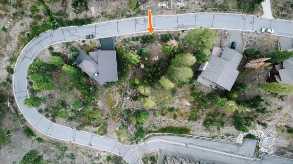 an aerial view of house with yard