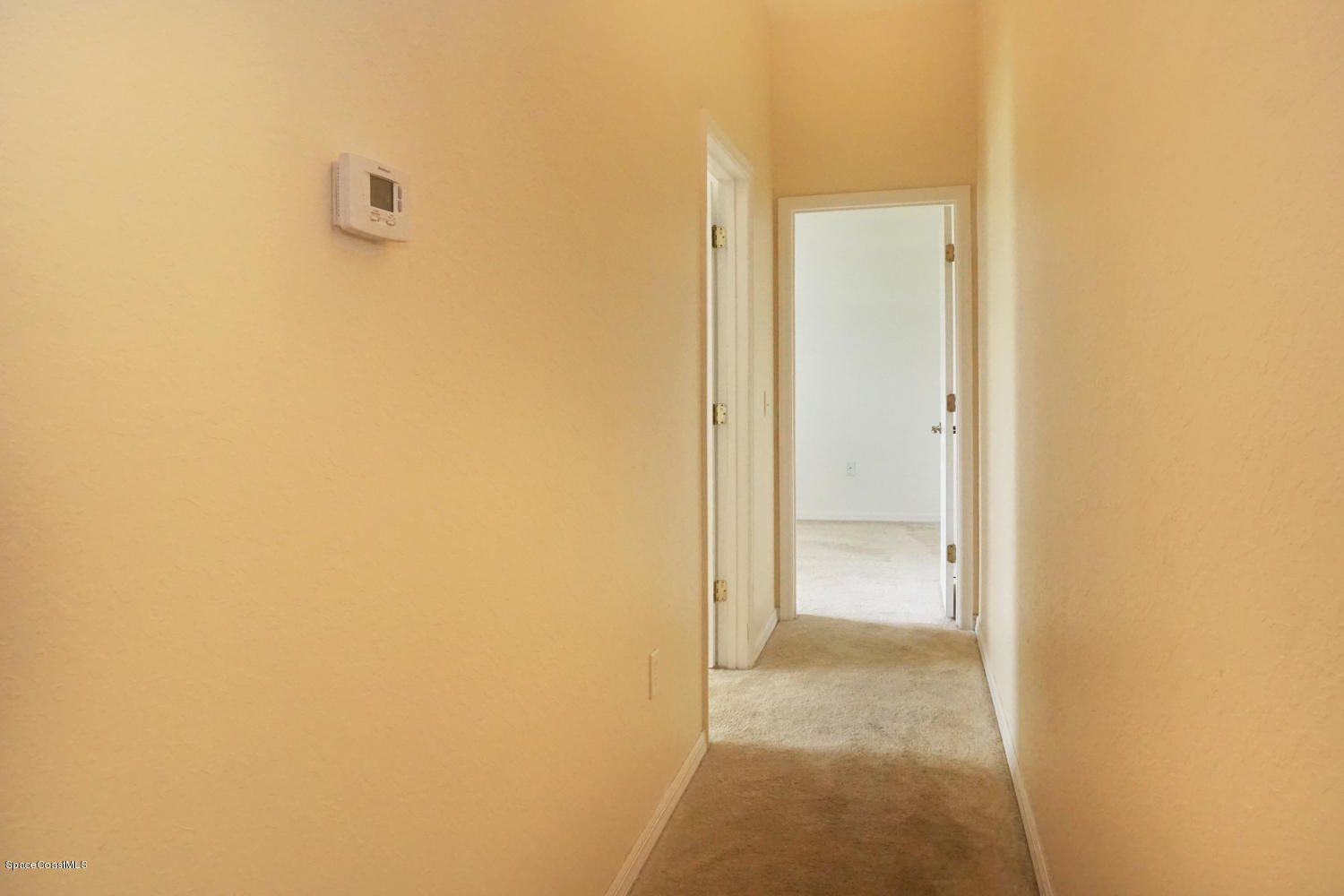 3052 Triangle Road Palm Bay, FL 32909 - Photo 45 of 49 Hallway for Bedrooms 2 and 3
