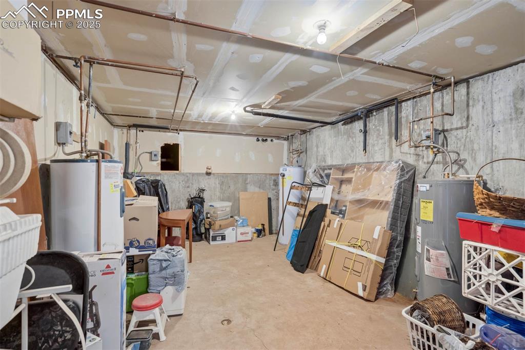 2387 Stepping Stones Way Colorado Springs, CO 80904 - Photo 25 of 35 a view of storage and utility room with toys