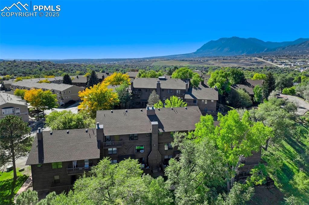 2387 Stepping Stones Way Colorado Springs, CO 80904 - Photo 28 of 35 an aerial view of a house with a garden