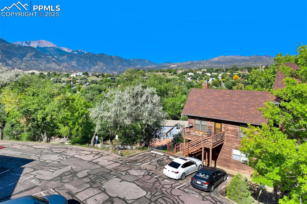 2387 Stepping Stones Way Colorado Springs, CO 80904 - Photo 3 of 35 a view of a patio with chair and tables
