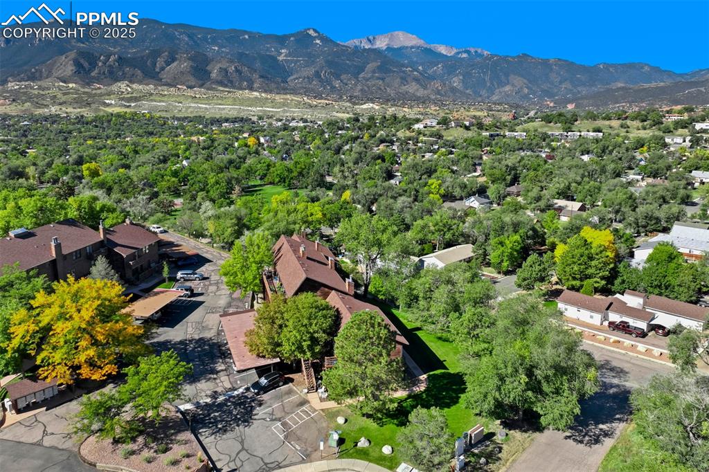 2387 Stepping Stones Way Colorado Springs, CO 80904 - Photo 31 of 35 a view of a lush green hillside and houses