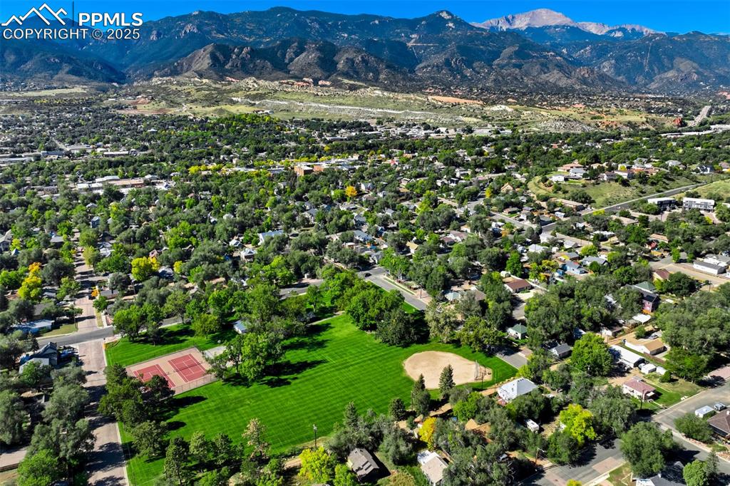 2387 Stepping Stones Way Colorado Springs, CO 80904 - Photo 35 of 35 a view of a lush green hillside and houses