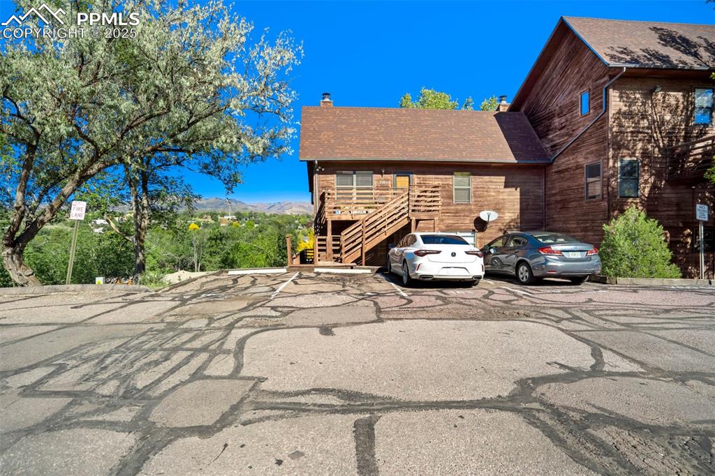 2387 Stepping Stones Way Colorado Springs, CO 80904 - Photo 4 of 35 a car parked in front of a house