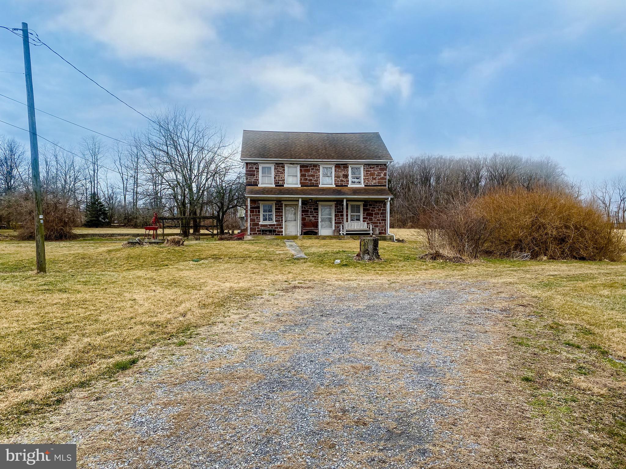 2101 Kramer Mill Road Stevens, PA 17578 - Photo 18 of 24 a view of a house with a big yard and large trees