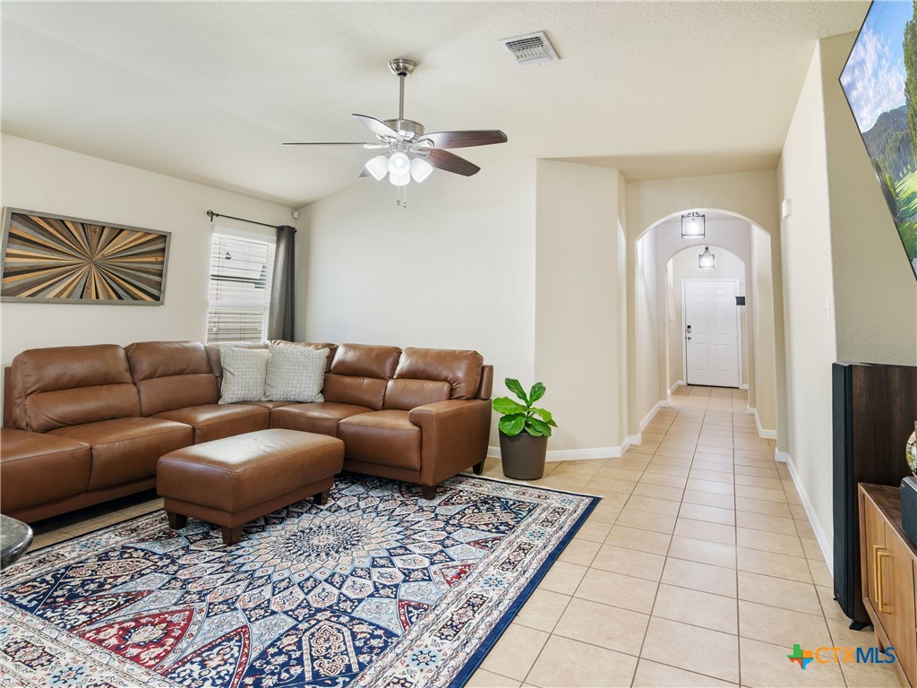 2231 Westover Loop New Braunfels, TX 78130 - Photo 16 of 36 a living room with furniture and a rug