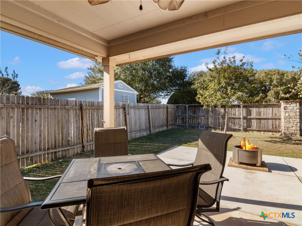 2231 Westover Loop New Braunfels, TX 78130 - Photo 27 of 35 a view of a patio with a table and chairs