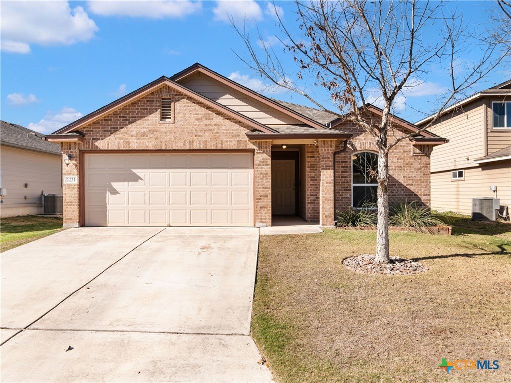 2231 Westover Loop New Braunfels, TX 78130 - Photo 3 of 36 a view of a house with a wooden fence