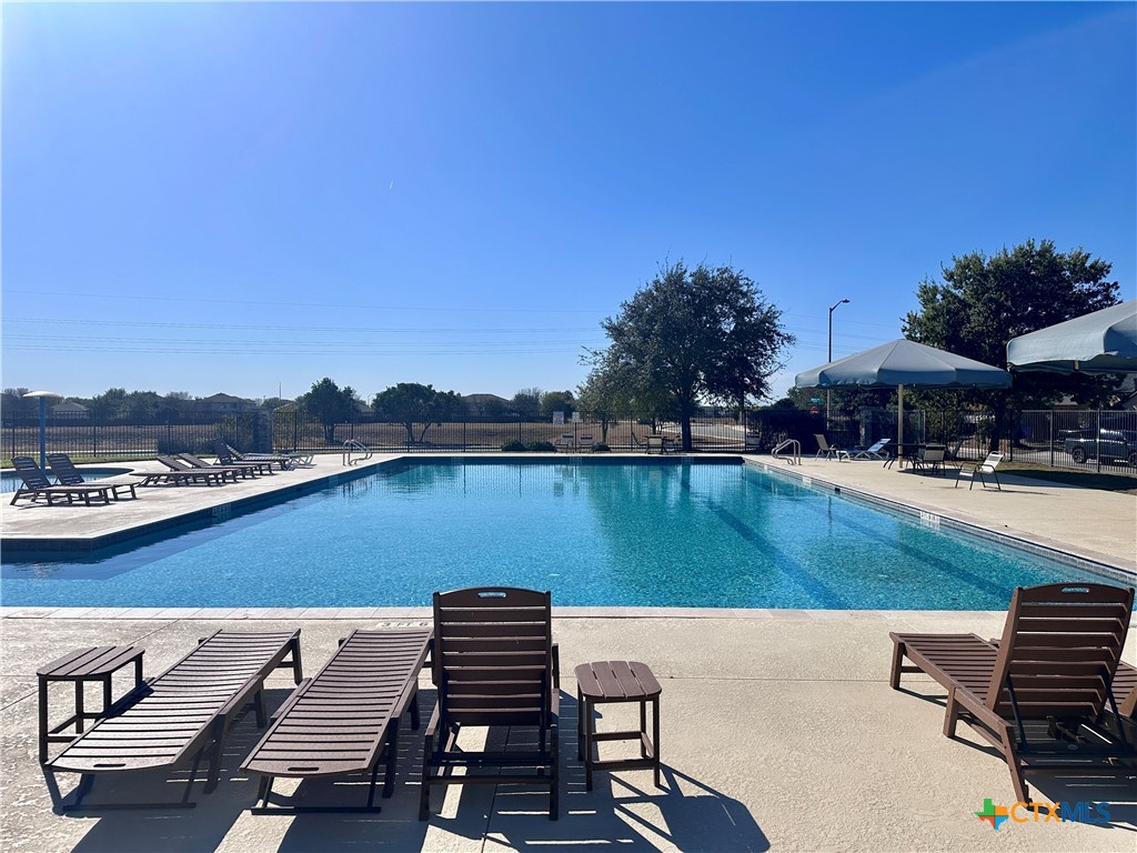 2231 Westover Loop New Braunfels, TX 78130 - Photo 31 of 35 a view of a lake with couches and city view