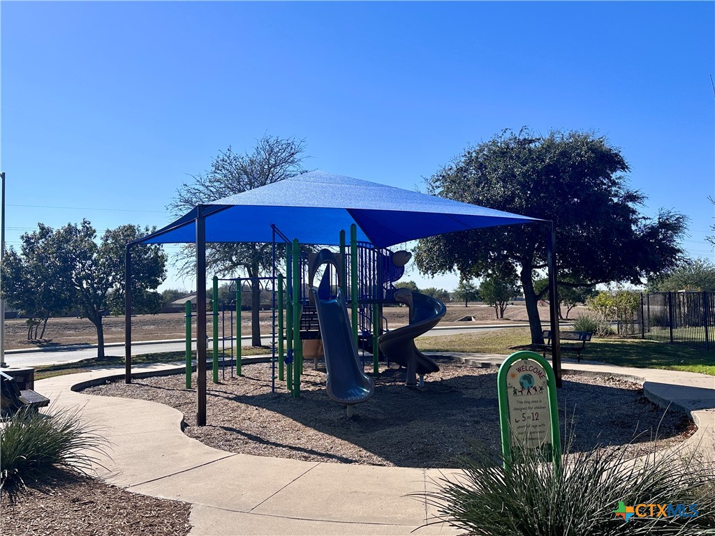2231 Westover Loop New Braunfels, TX 78130 - Photo 36 of 36 a view of outdoor space yard deck patio and outdoor kitchen