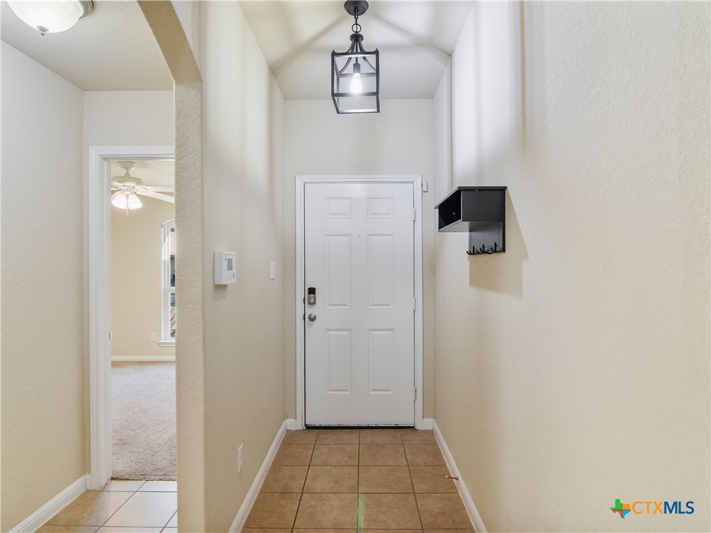2231 Westover Loop New Braunfels, TX 78130 - Photo 7 of 35 a view of a hallway with front door