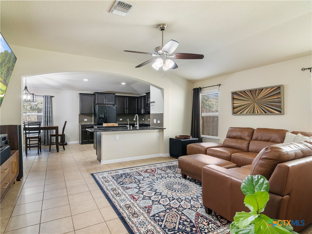 2231 Westover Loop New Braunfels, TX 78130 - Photo 8 of 35 a living room with furniture and kitchen view