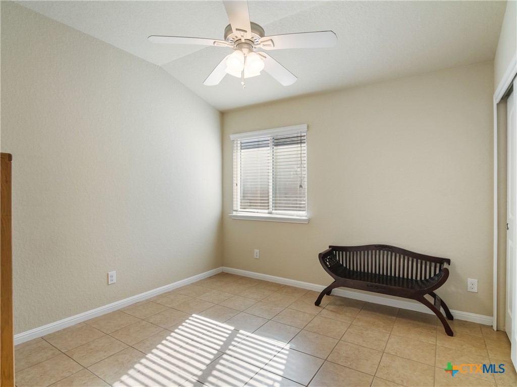 2231 Westover Loop New Braunfels, TX 78130 - Photo 9 of 36 a room with a piano and wooden floor