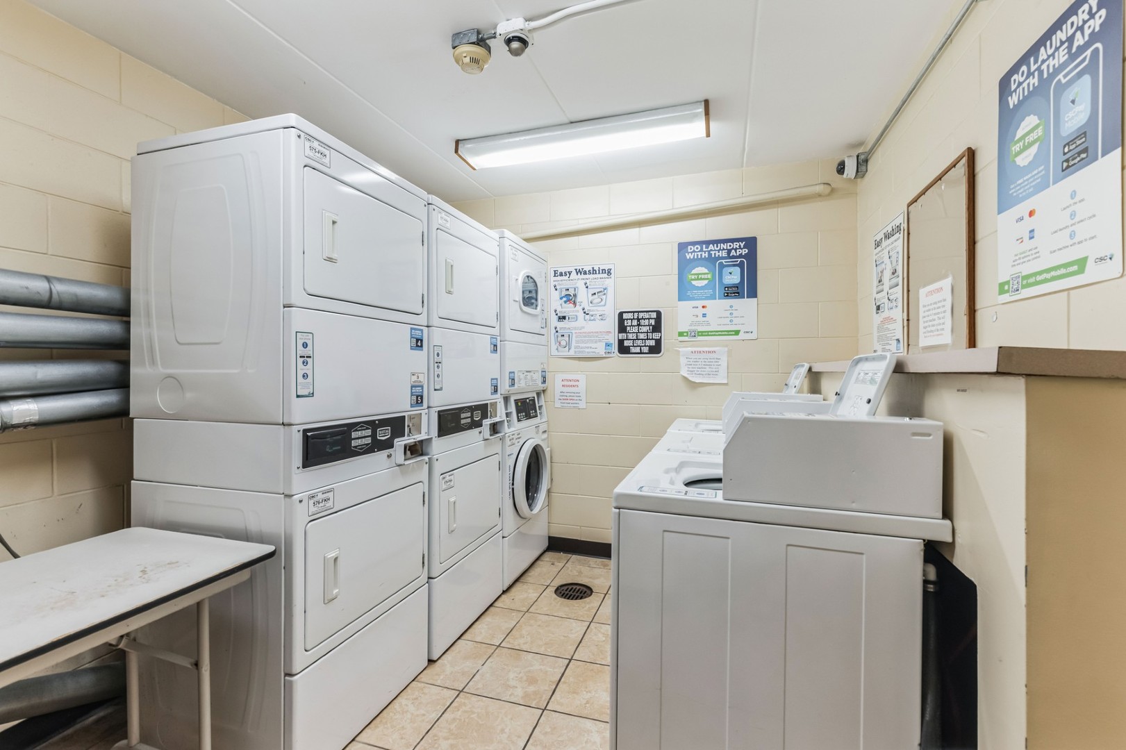 225 South Rohlwing Road, Unit 218 Palatine, IL 60074 - Photo 20 of 20 a utility room with dryer and washer