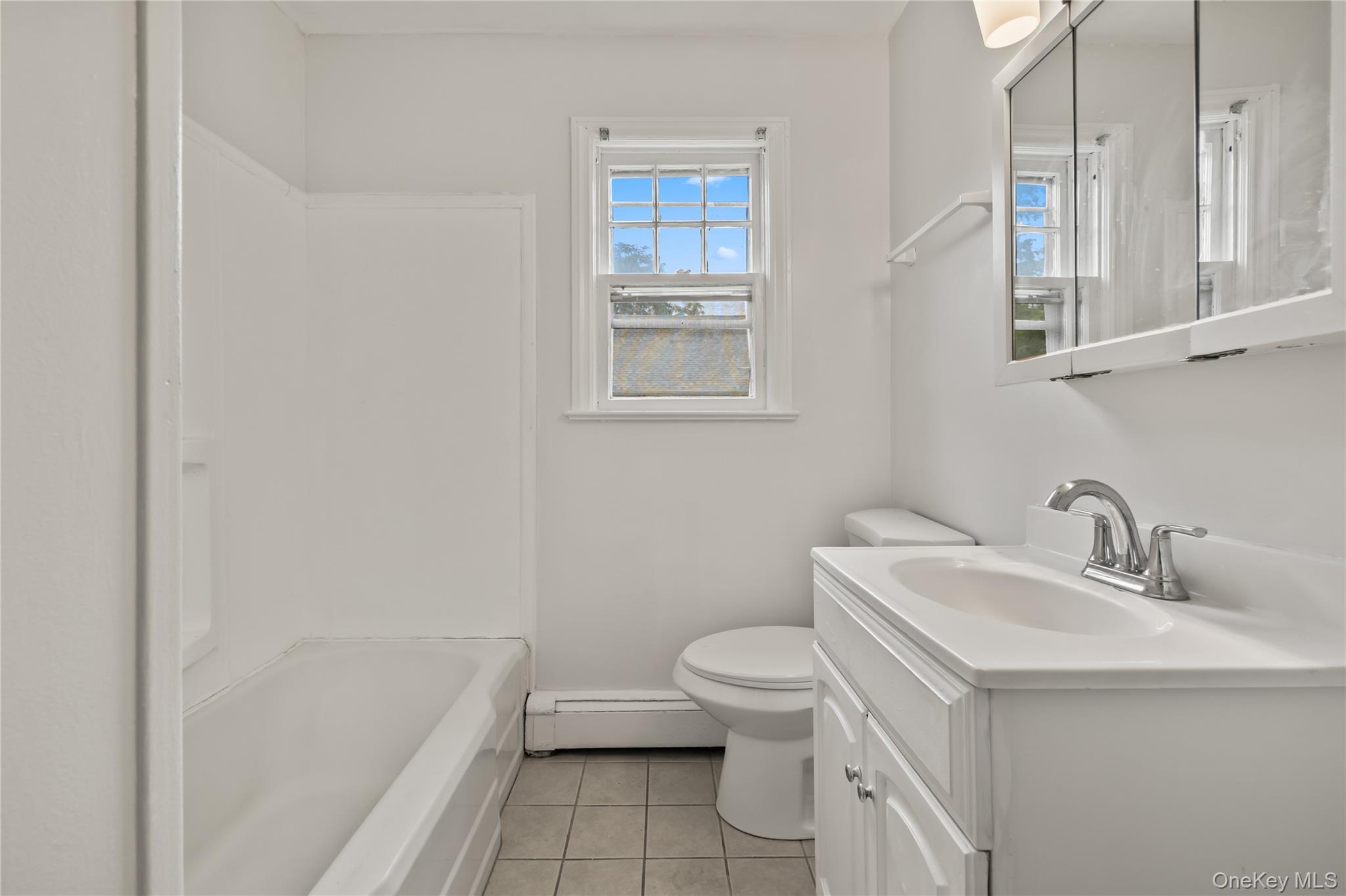 281-283 Old Haverstraw Road Congers, NY 10920 - Photo 17 of 41 a bathroom with a sink toilet and shower