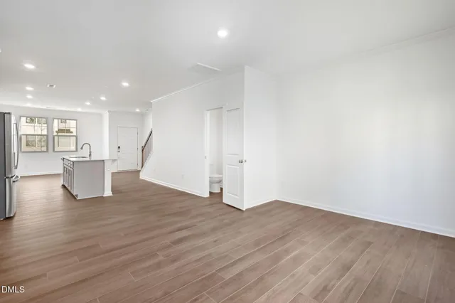 a view of a livingroom with wooden floor
