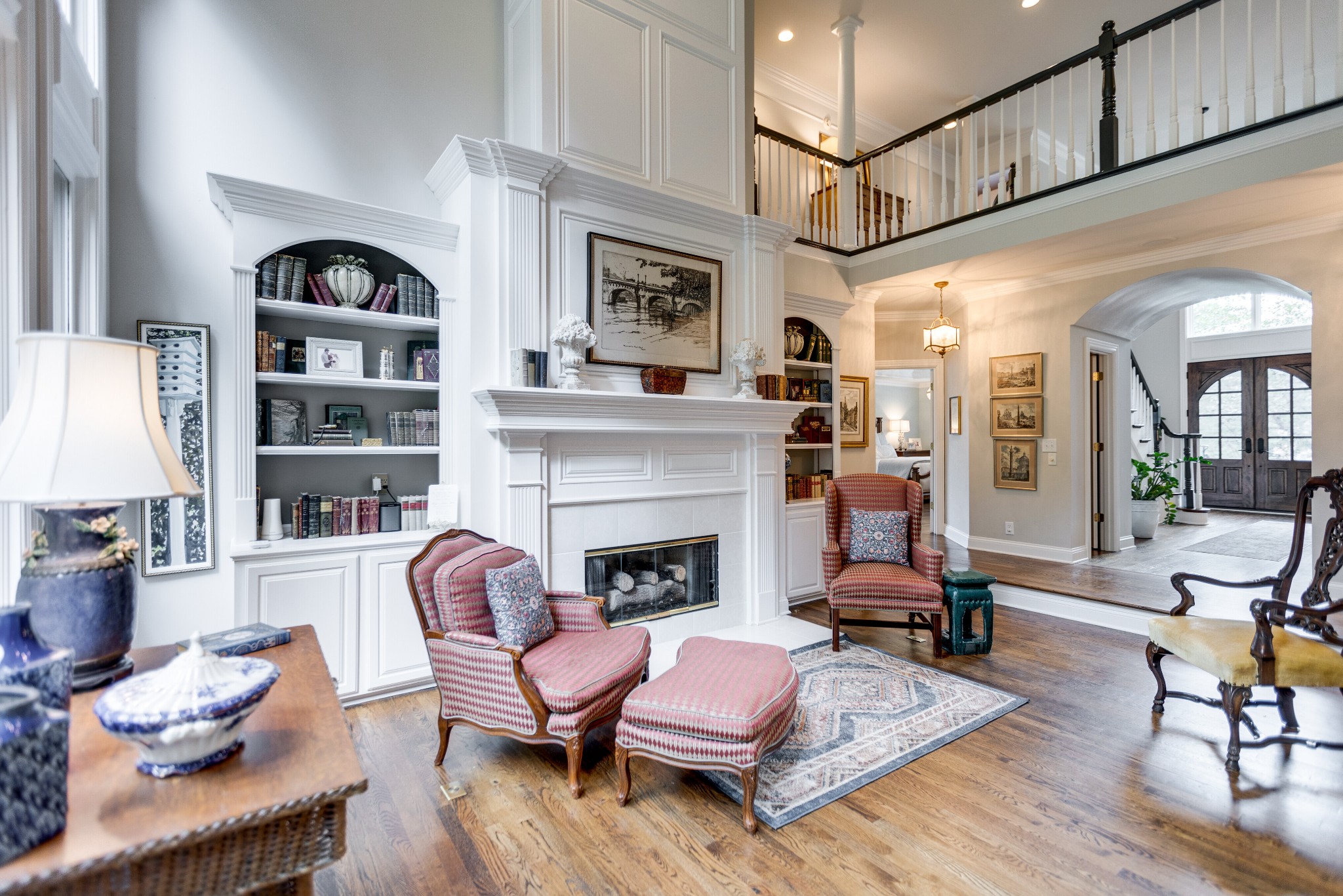 232 Bramerton Court Franklin, TN 37069 - Photo 12 of 58 a living room with furniture fireplace and wooden floor
