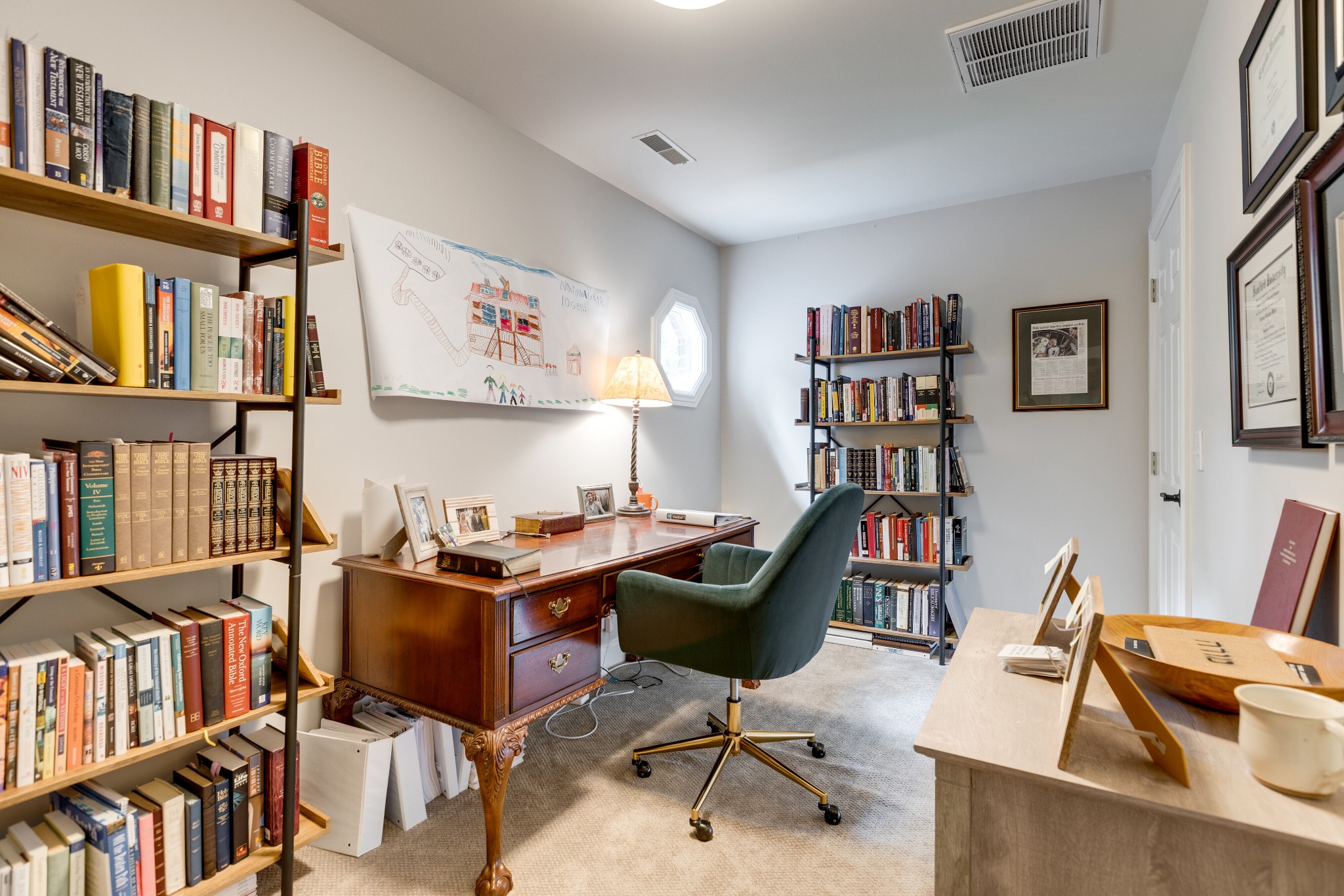 232 Bramerton Court Franklin, TN 37069 - Photo 31 of 58 a view of a workspace with furniture and book shelf