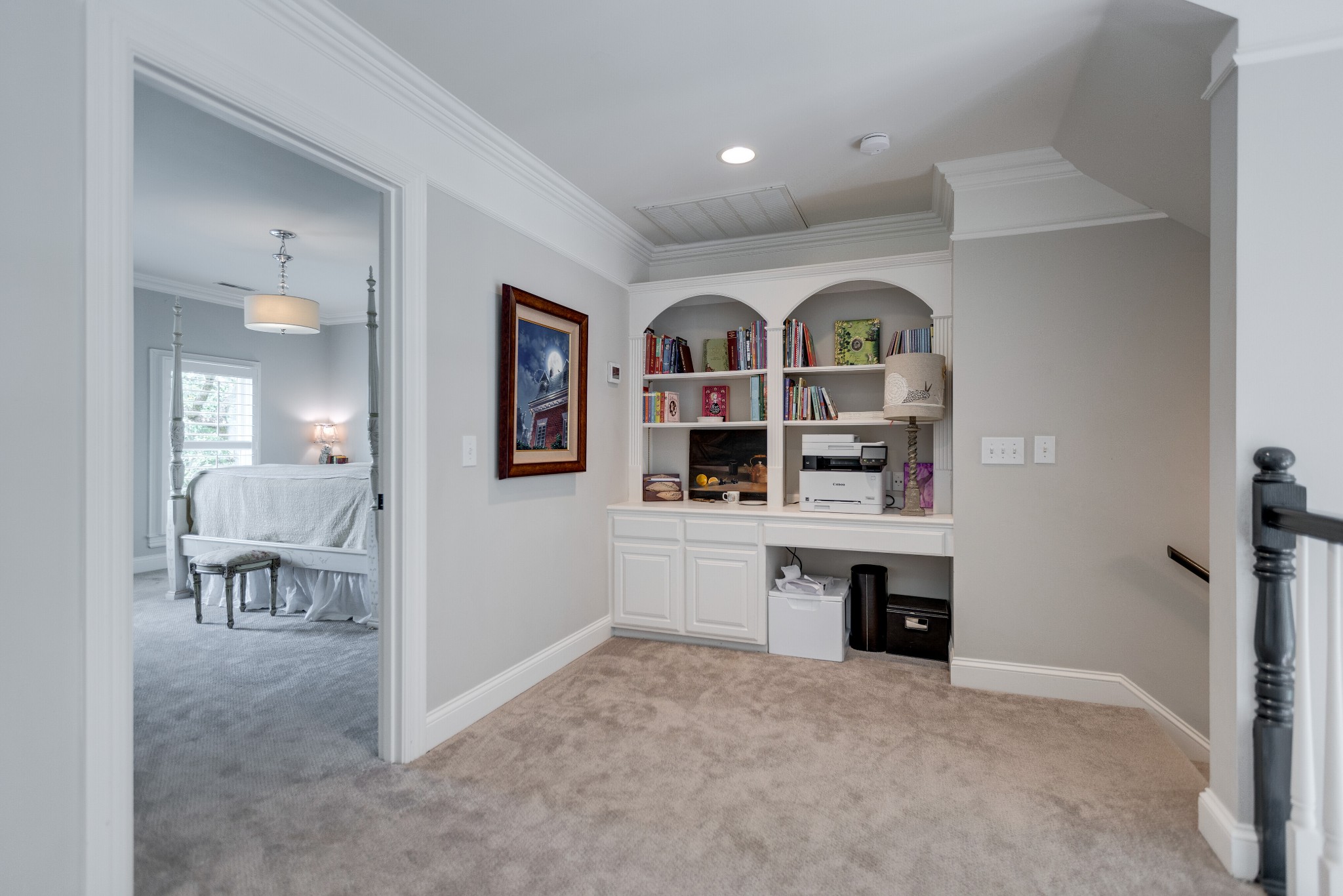 232 Bramerton Court Franklin, TN 37069 - Photo 37 of 58 walk in closet with a couch and a view of living room