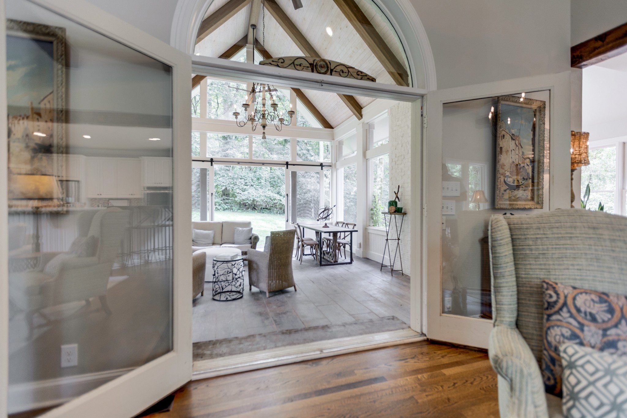 232 Bramerton Court Franklin, TN 37069 - Photo 39 of 58 a view of a living room and a window with chandelier