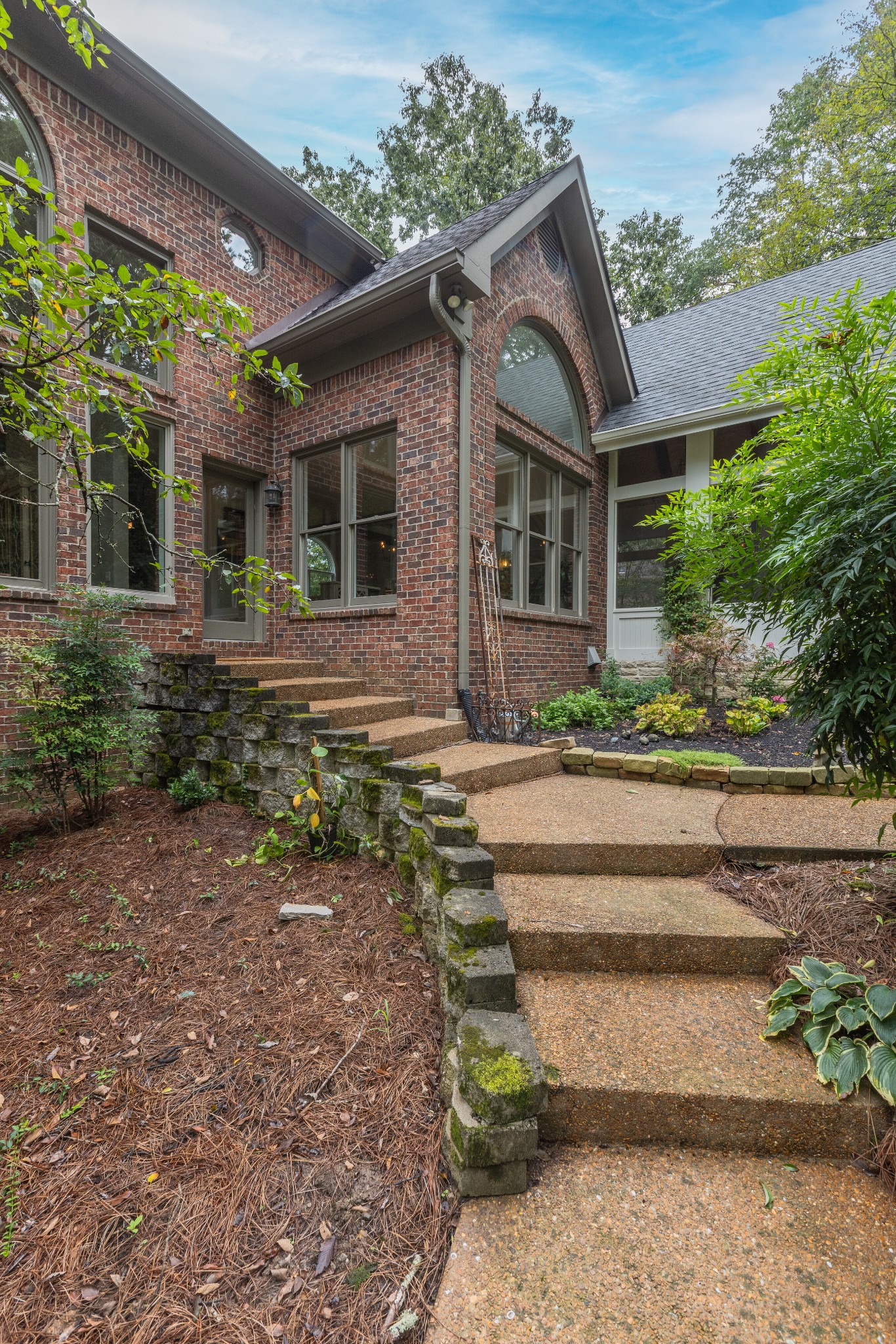 232 Bramerton Court Franklin, TN 37069 - Photo 44 of 58 a front view of a house with garden