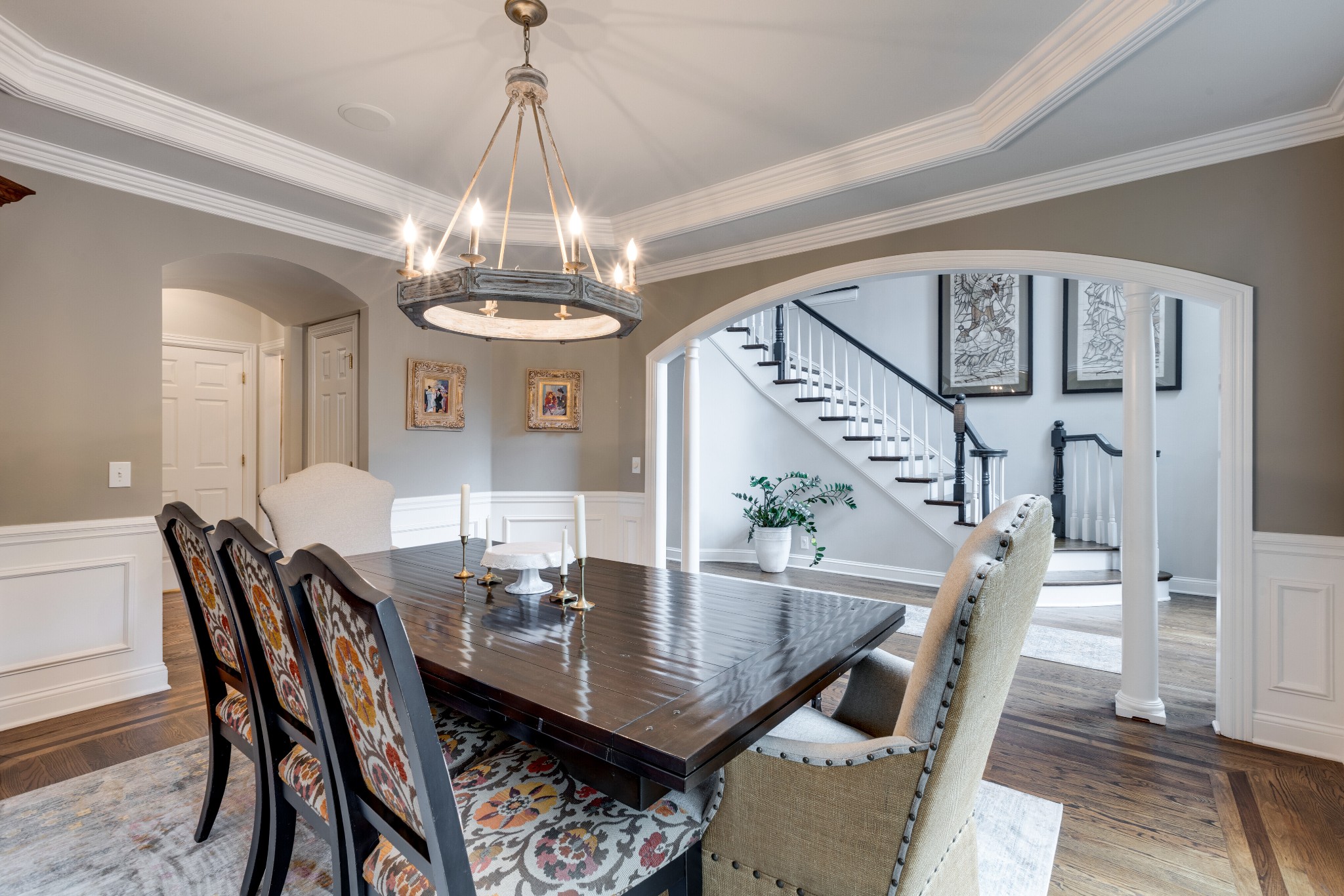 232 Bramerton Court Franklin, TN 37069 - Photo 9 of 58 a view of a dining room and livingroom with furniture wooden floor and a chandelier