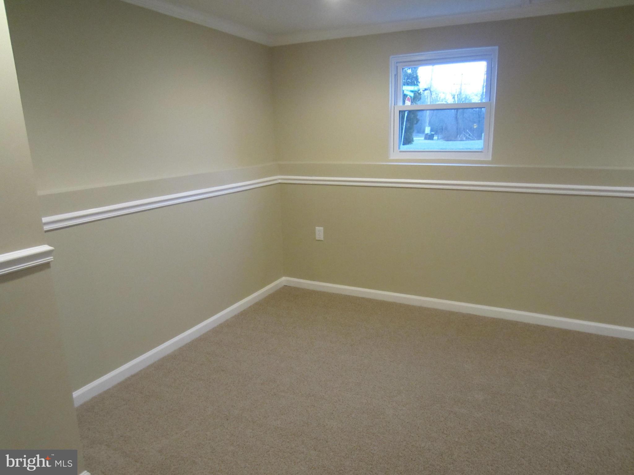 418 Laburnum Road Edgewood, MD 21040 - Photo 16 of 27 an empty room with windows