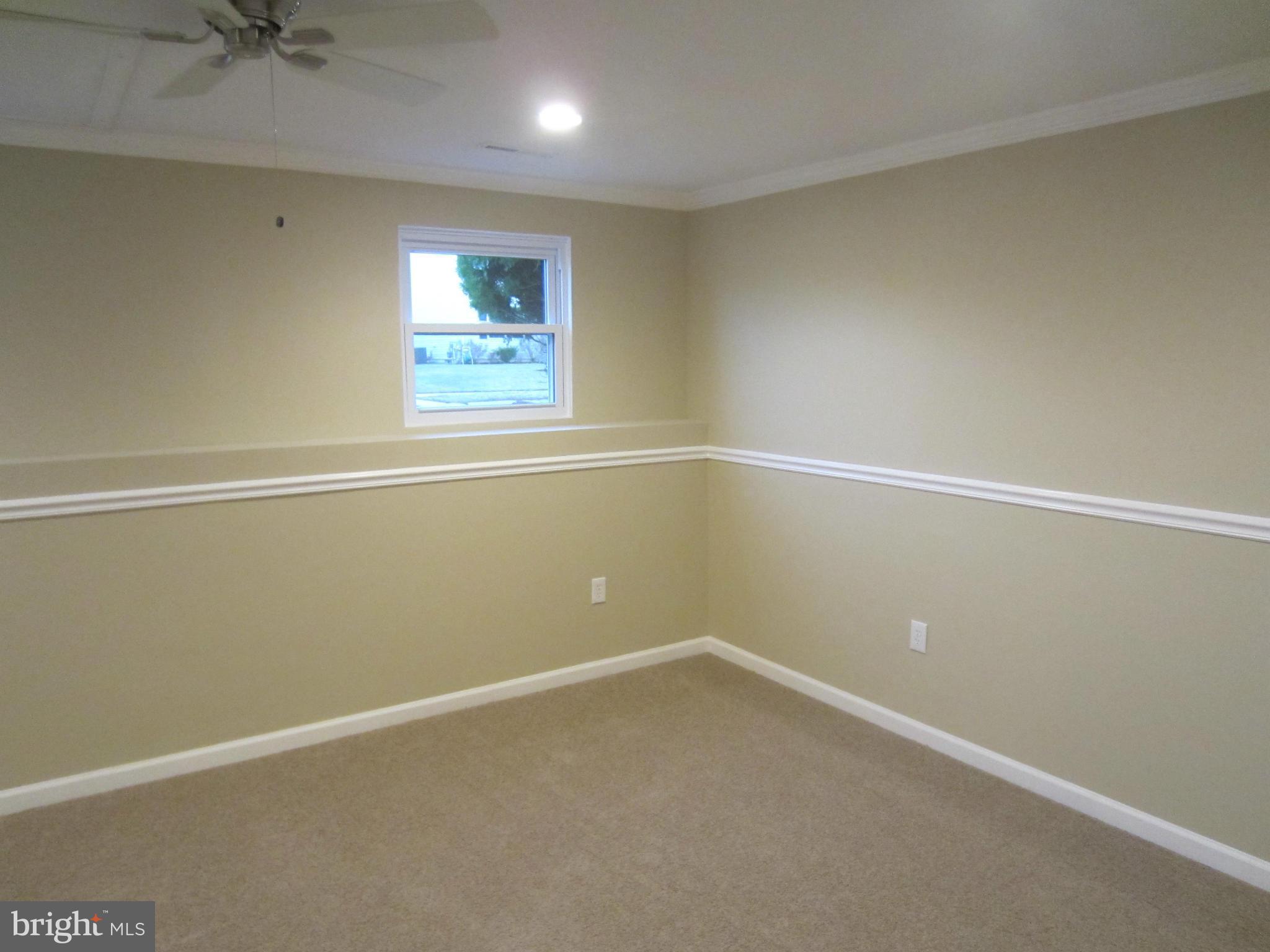 418 Laburnum Road Edgewood, MD 21040 - Photo 18 of 27 an empty room with a window