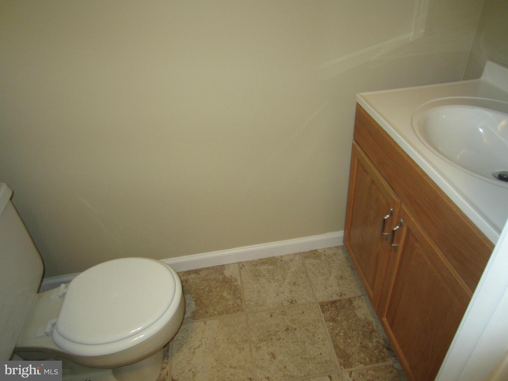 418 Laburnum Road Edgewood, MD 21040 - Photo 20 of 27 a bathroom with a sink and a toilet