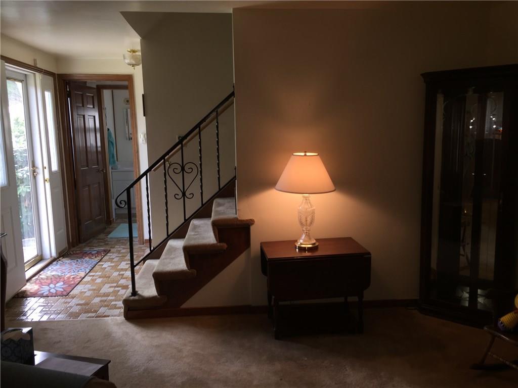 177 McIntyre Road Pittsburgh, PA 15237 - Photo 2 of 10 Foyer boasts a bright front door with side lights and durable ceramic flooring, wide staircase leading to the second floor with 4 bedrooms and 2 full baths!