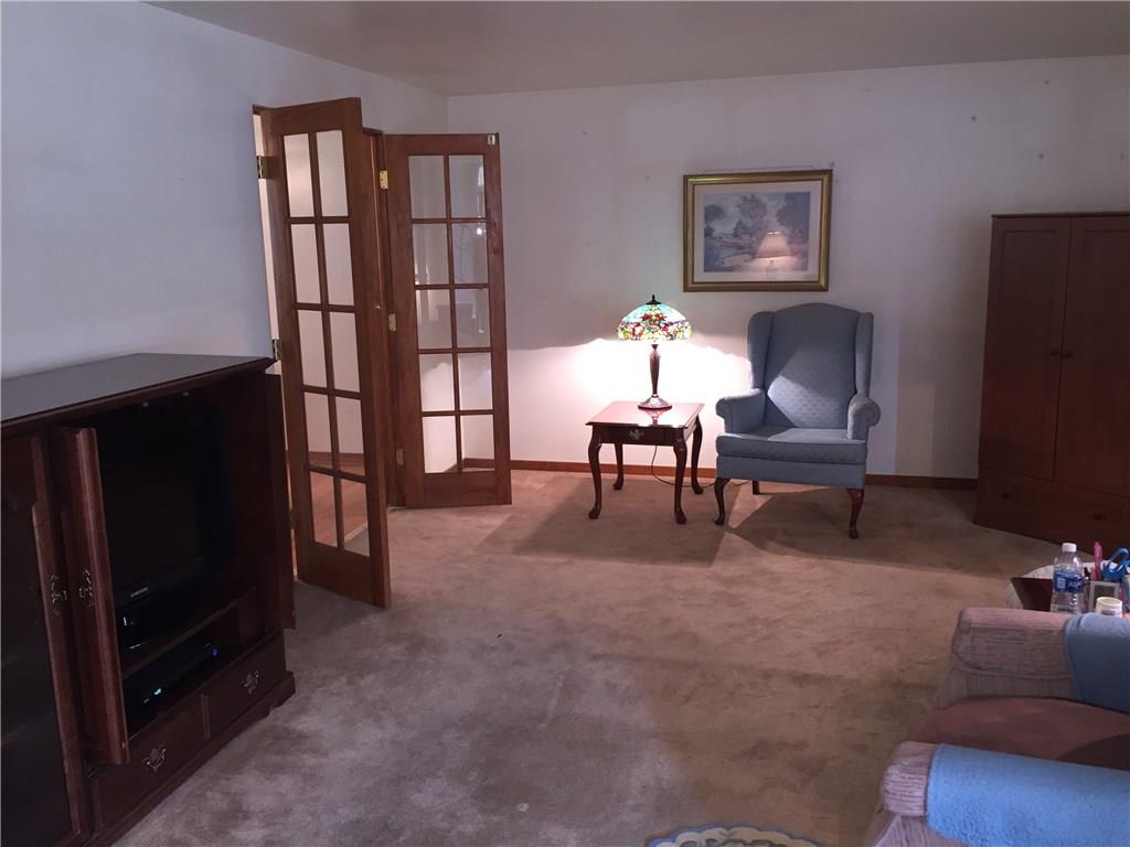 177 McIntyre Road Pittsburgh, PA 15237 - Photo 3 of 10 Large living room with hard wood floors under the carpet!